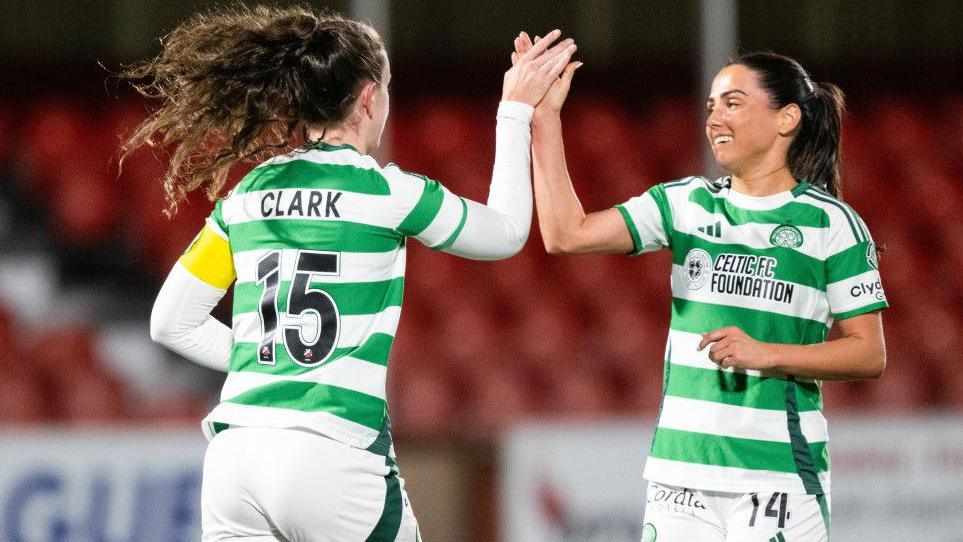 Celtic's Kelly Clark (L) celebrates scoring to make it 2-0 with teammate Shannon McGregor (R) during a ScottishPower Scottish Women's Premier League match between Celtic and Queen's Park at the ZLX Stadium, on November 06, 2024, in Hamilton, 