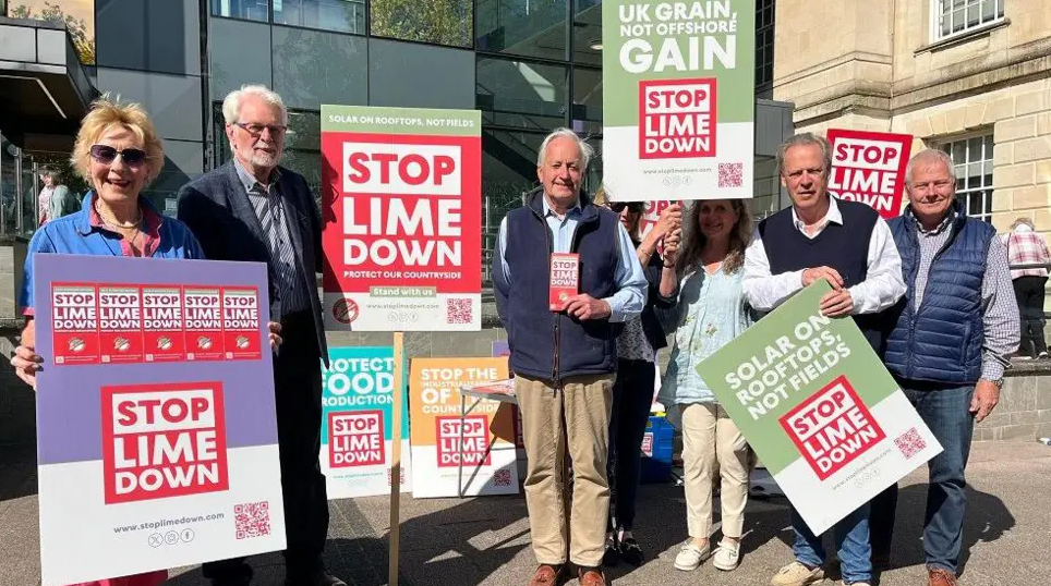 People stood with signs which said 'Stop Lime Down' in various sizes and texts outside Trowbridge Town Hall