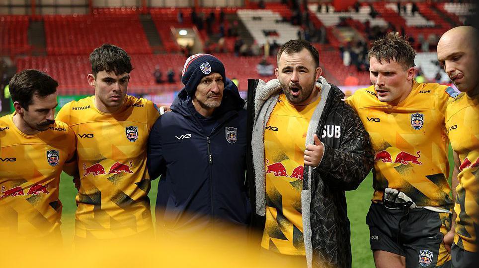Newcastle's players huddle up