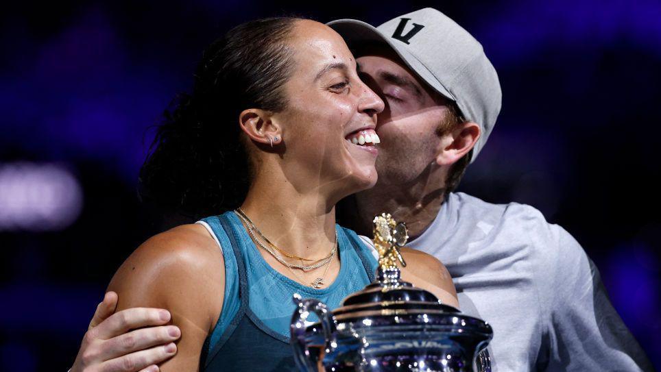 Madison Keys is kissed by her husband Bjorn Fratangelo after winning the Australian Open