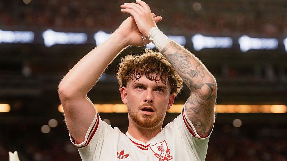 Harvey Elliott claps Liverpool fans
