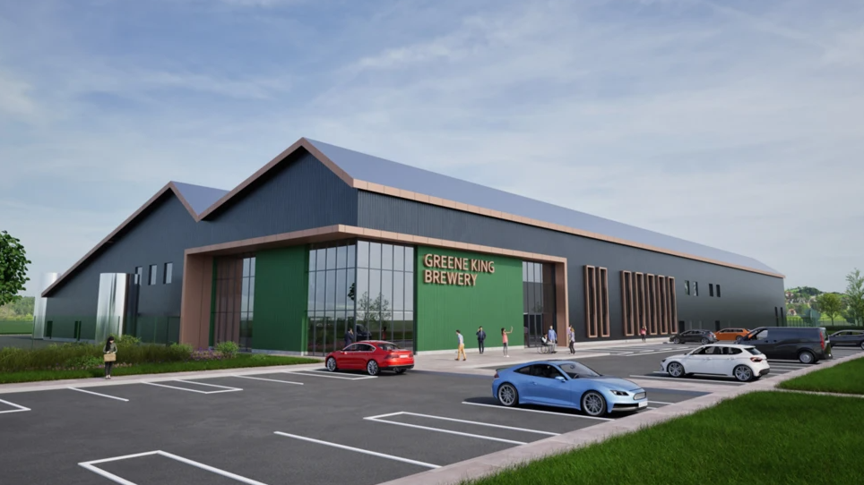 A mock-up image of what Greene King's new brewery could look like. It is green and  black. Cars can be seen parked outside while visitors look around.