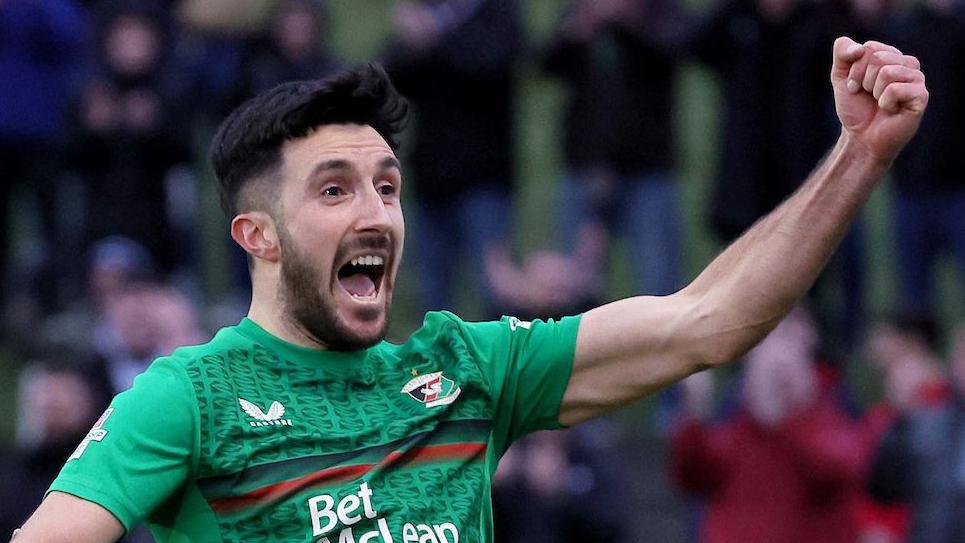 Joy for Danny Amos after scoring a late winner for Glentoran at the Oval