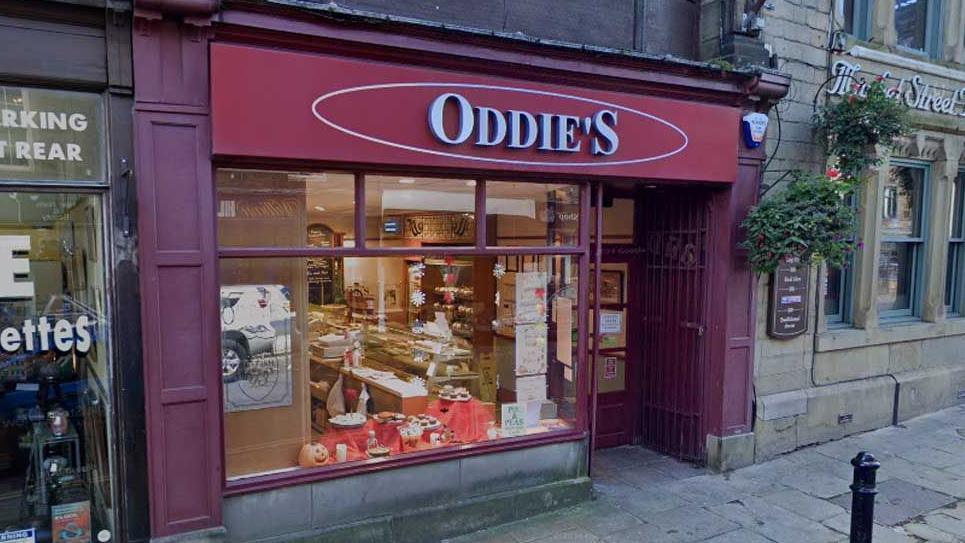 Street view of the shop front of an Oddies bakery in Colne