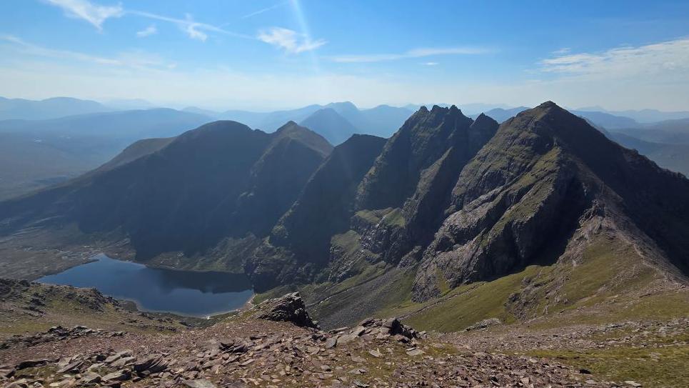 Rocky mountain pinnacles and a loch