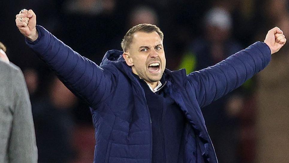 Tonda Eckert celebrating