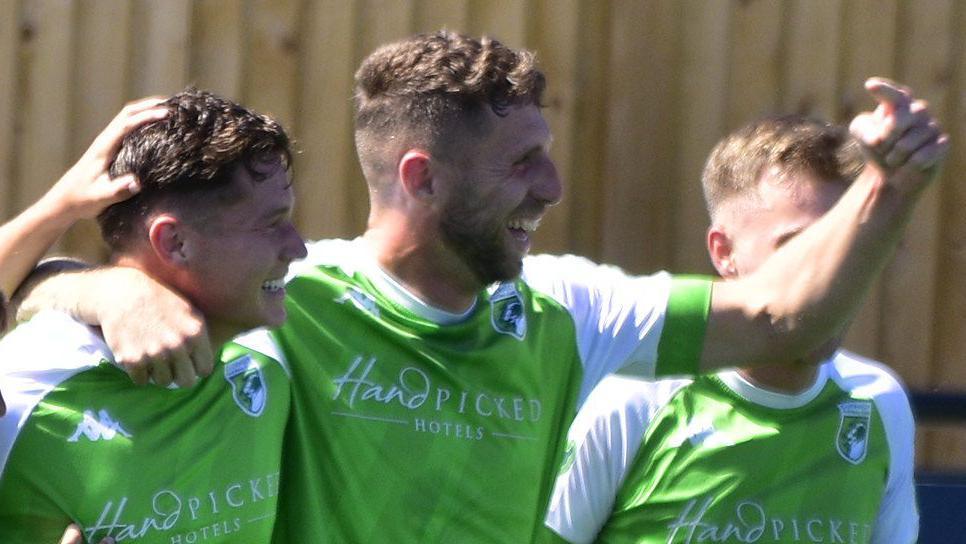 Sam Murray celebrates