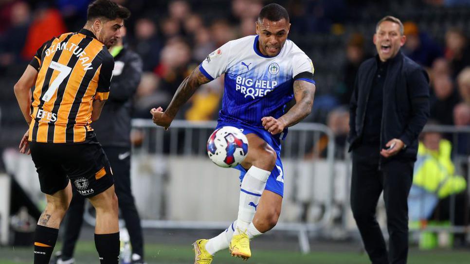 Josh Magennis in possession for Wigan against Hull City