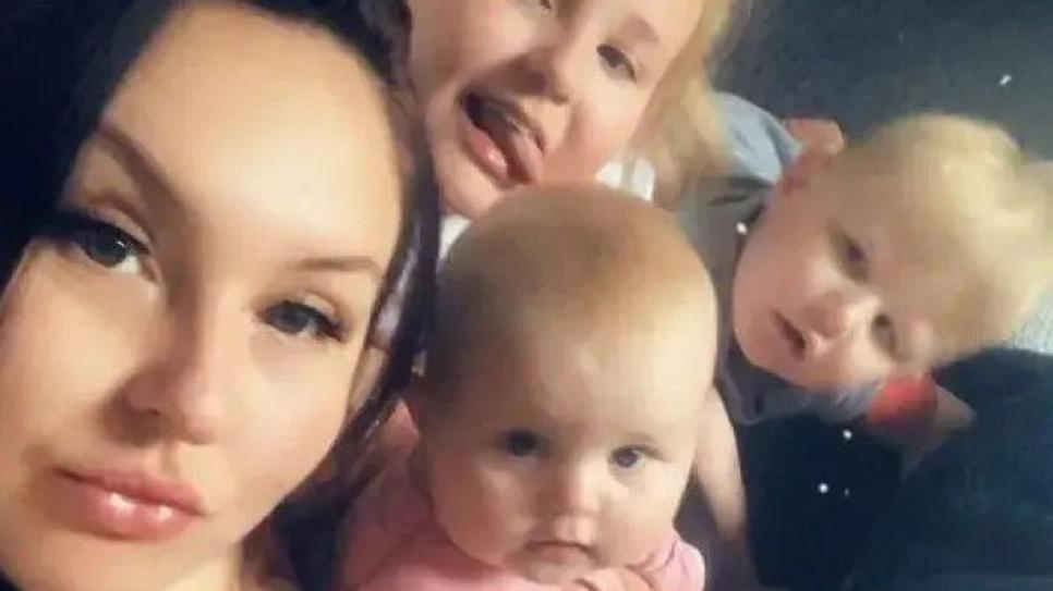 Bryonie Gawith with children Denisty Birtle (background), Aubree Birtle (centre) and Oscar Birtle (right).