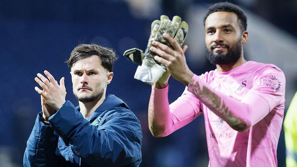 Liam Cullen and Lawrence Vigouroux applaud Swansea fans after the Preston draw