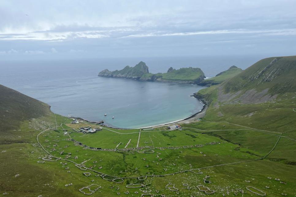 Ruined buildings and a bay on Hirta in St Kilda