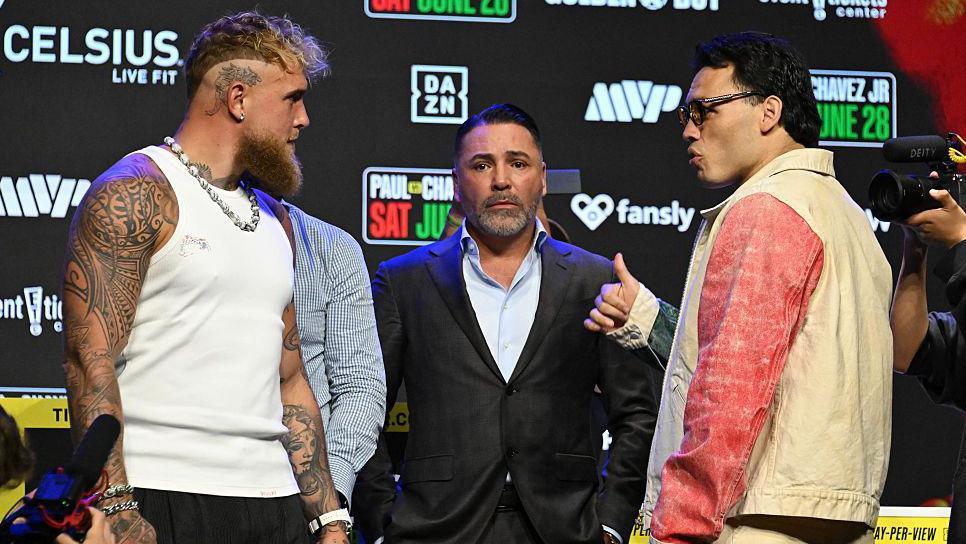 Jake Paul stares at Julio Cesar Chavez Jr during a face-off
