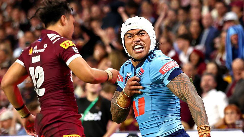 New South Wales' Brian To'o celebrate a try against Queensland
