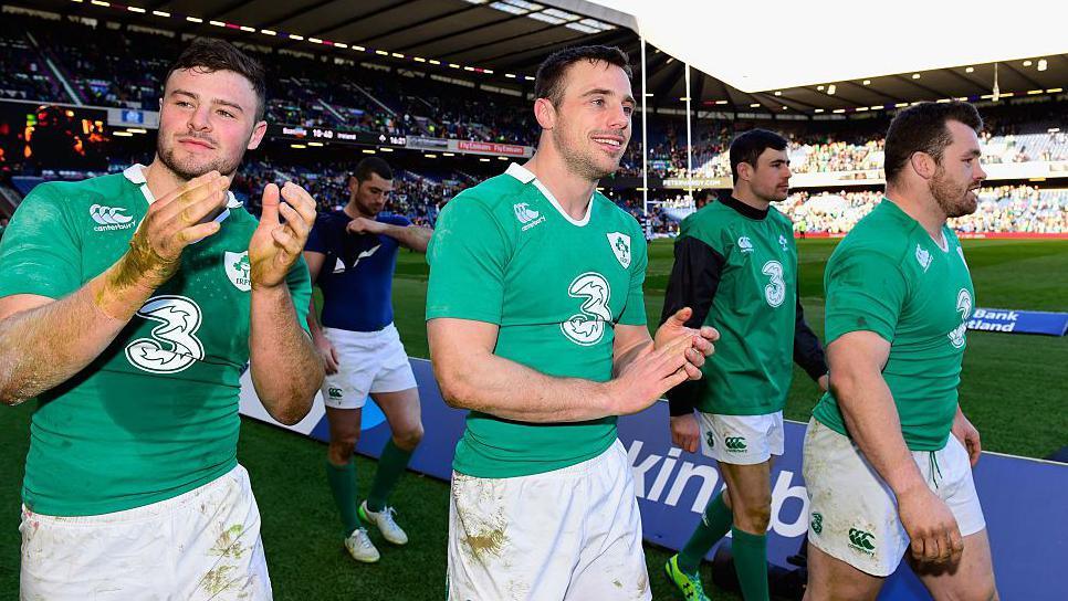 Robbie Henshaw and Tommy Bowe applaud the crowd