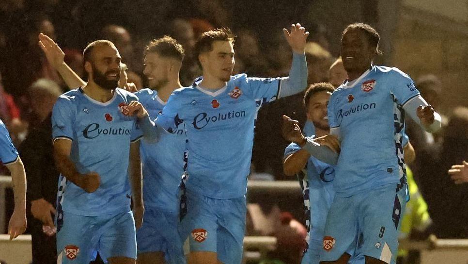 Kettering Town's Nile Ranger (right) celebrates scoring his side's second goal of the game during the Emirates FA Cup first round match at Sixfields Stadium, Northampton. Picture date: Saturday November 2, 2024.