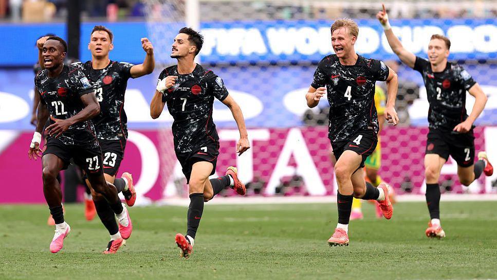Canada players celebrate