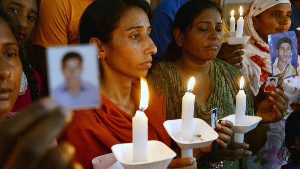 Relatives of Indian prisoners jailed in Iraq pose at a church in Amritsar on June 26, 2014.