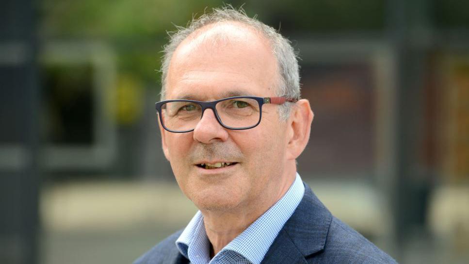 Head and shoulders photograph of  Prof Neal Juster, Vice Chancellor at the University of Lincoln