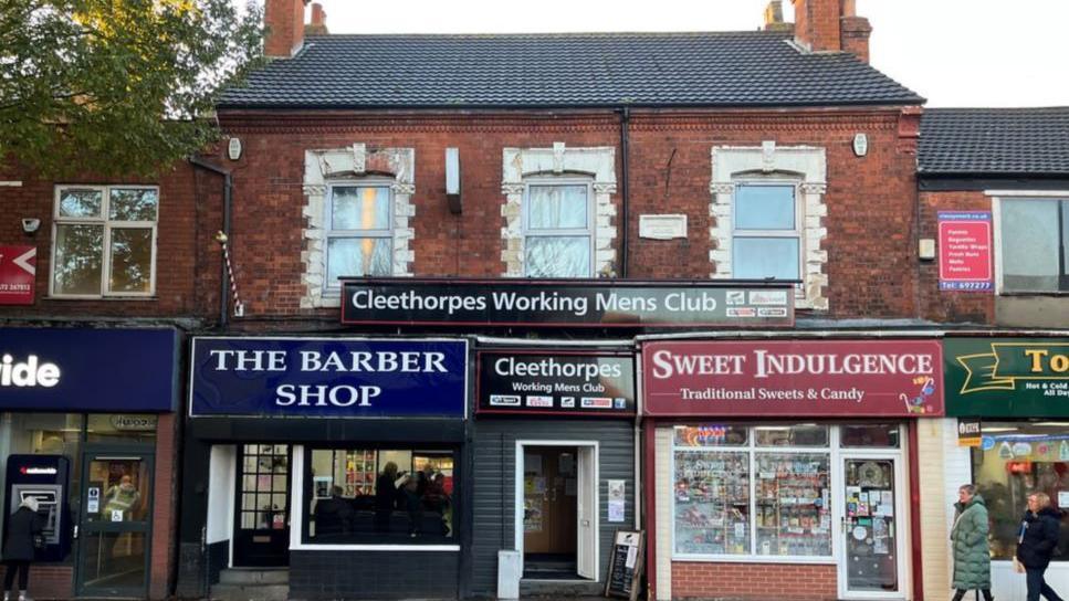 Cleethorpes Working Mens Club situated in-between Sweet Indulgence and The Barber Shop