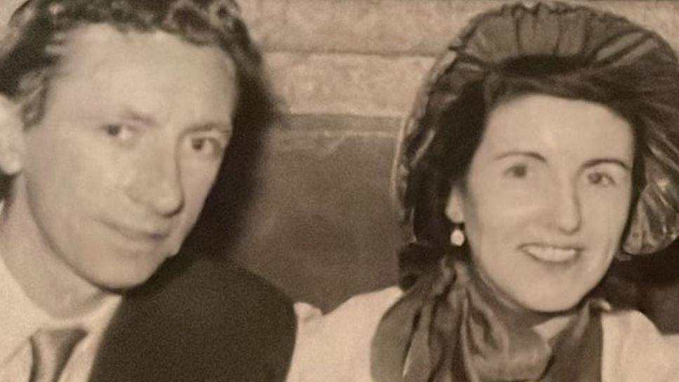 Black-and-white image of Eddie Morgan wearing a suit and his bride Mary Gorry wearing a bonnet.