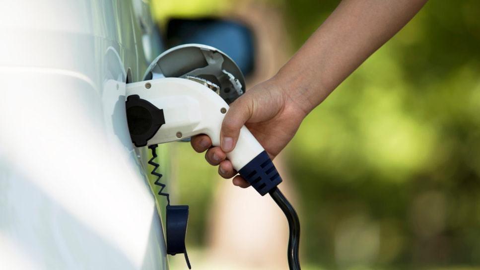 Electric car charger plugged in