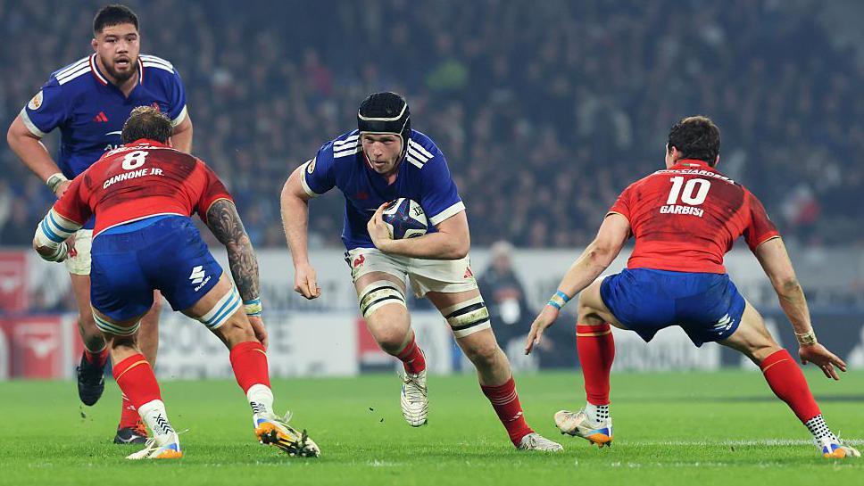 Thibaud Flament running with the ball for France