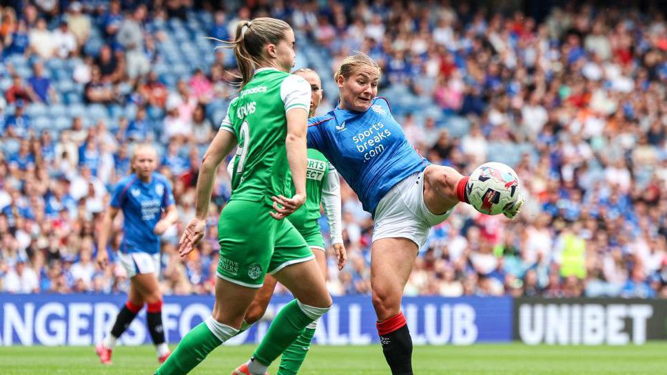 Hibernian's Eilish Adams and Rangers' Katie Wilkinson in action at Ibrox in May