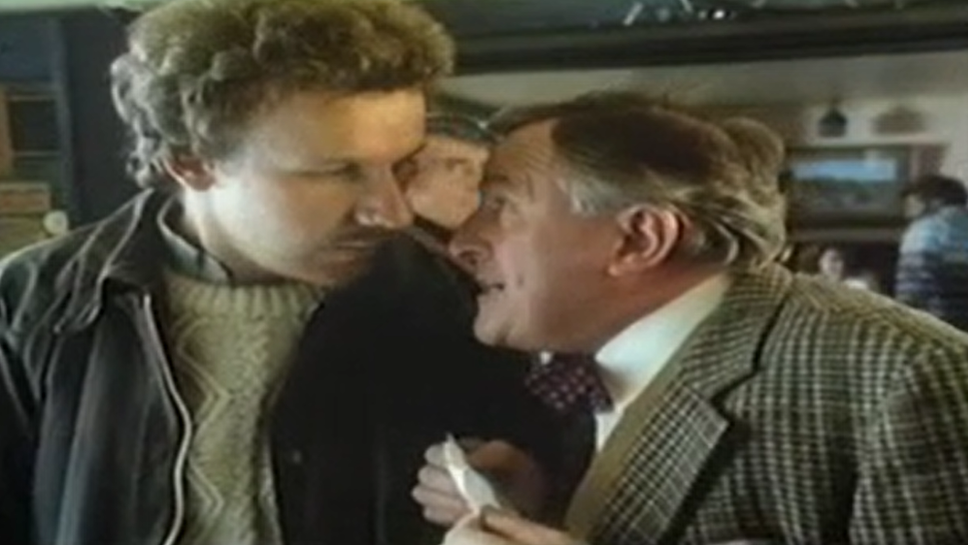 Still from Tell Sid campaign with a man talking quietly to another man
