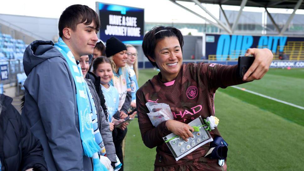 Manchester City goalkeeper Ayaka Yamashita with fans at the Joie Stadium this season