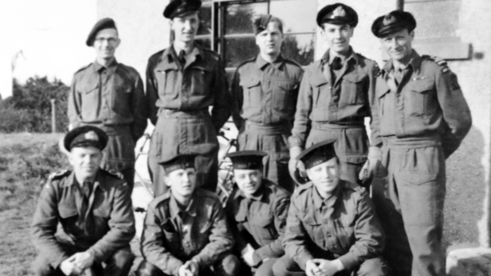 A b&w photo of some original COPPists in uniform