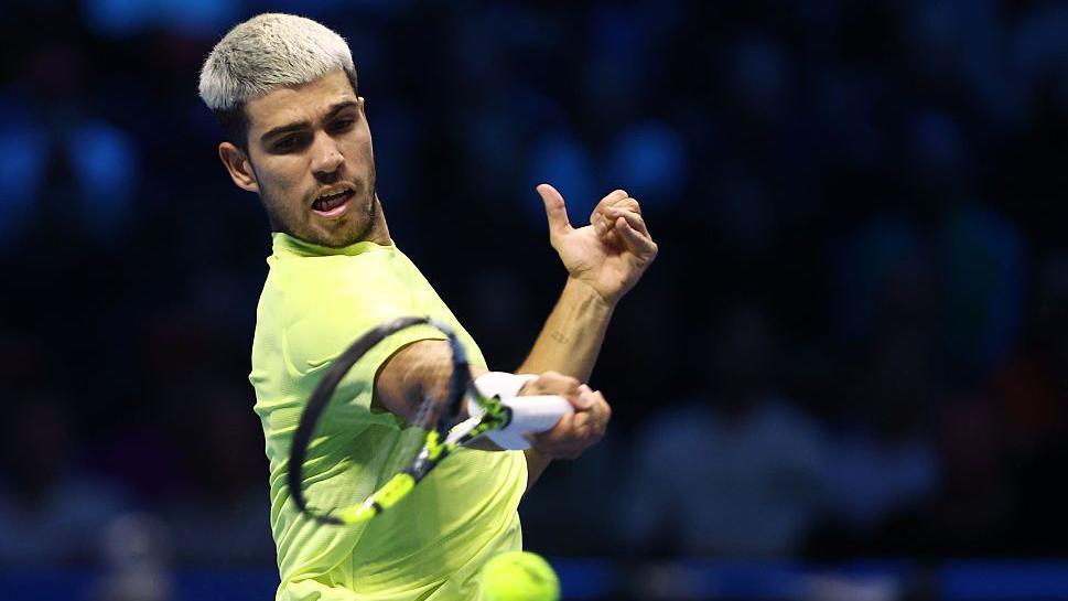 Carlos Alcaraz hits a forehand during the ATP Finals in Turin