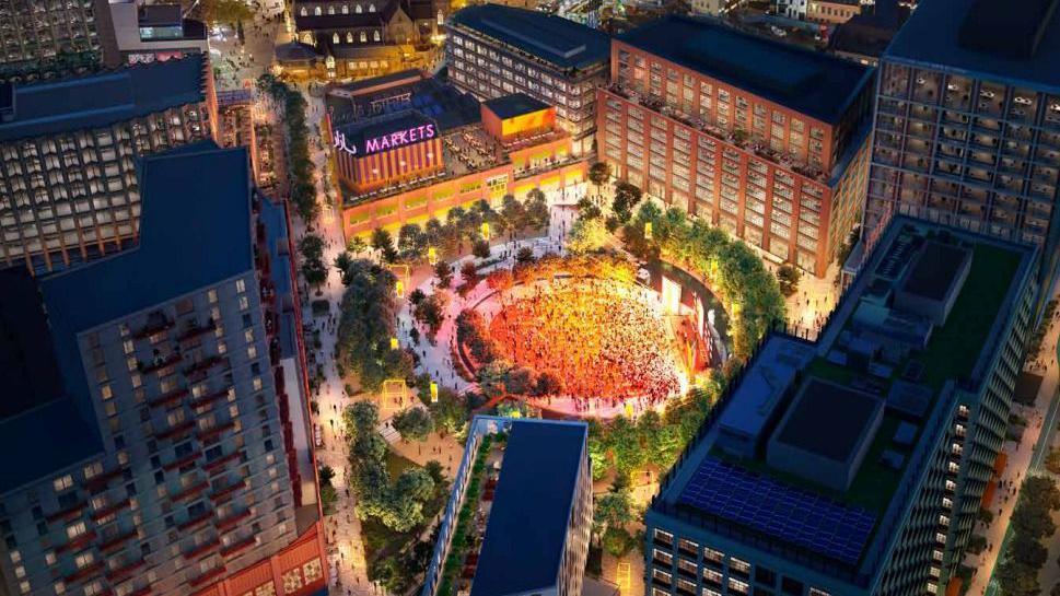 A computer-generated image of the Smithfield development, reveals a bird's eye-view at night of a brightly-lit circular open space filled with people, surrounded by tall buildings.