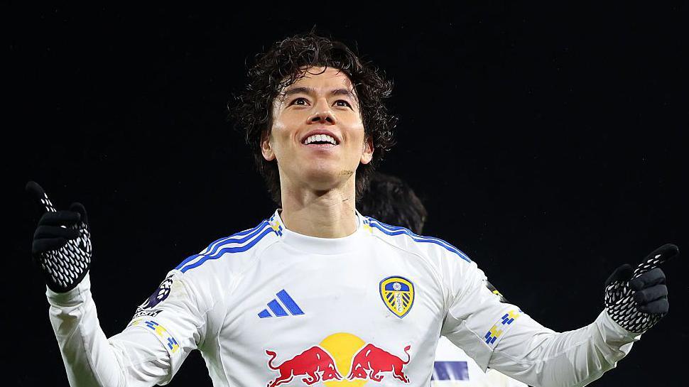 Ao Tanaka celebrates his late leveller