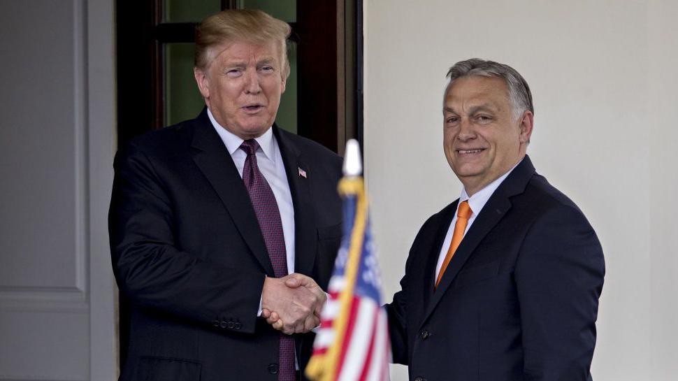 Donald Trump, left, shakes hands with Viktor Orban at the West Wing of the White House in Washington DC, 13 May 2019