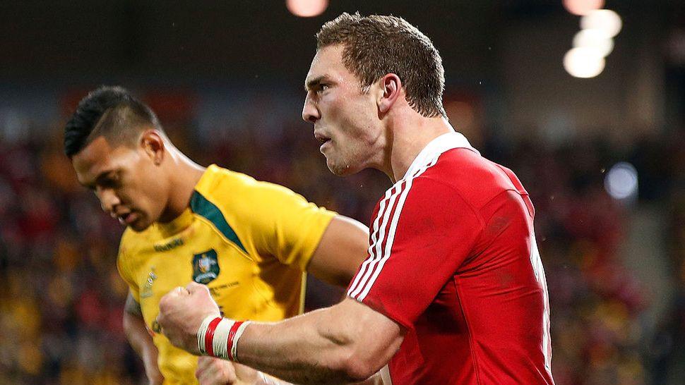 George North celebrates scoring the opening try as the Lions win the first Test 23-21 in 2013. Israel Folau looks dejected in the background