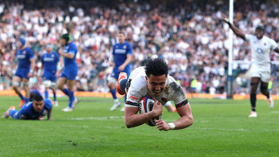 Marcus Smith of England dives over for their fourth try during the match versus Italy.