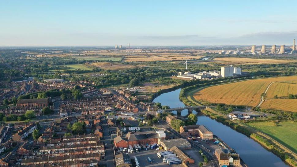 Aerial view of buildings in Gainsborough with the River Trent, which marks the border with Nottinghamshire, in view.