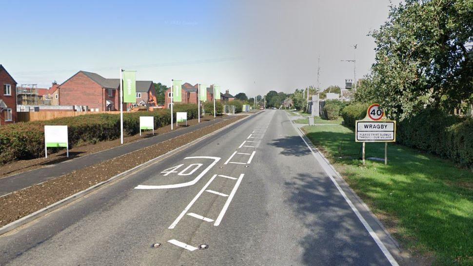 A Google Maps shot of Horncastle Road. There is a new estate on the left of the road and a white sign saying "40" above "Wragby".