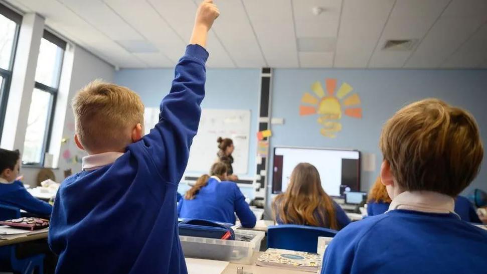 Stock image of children in class