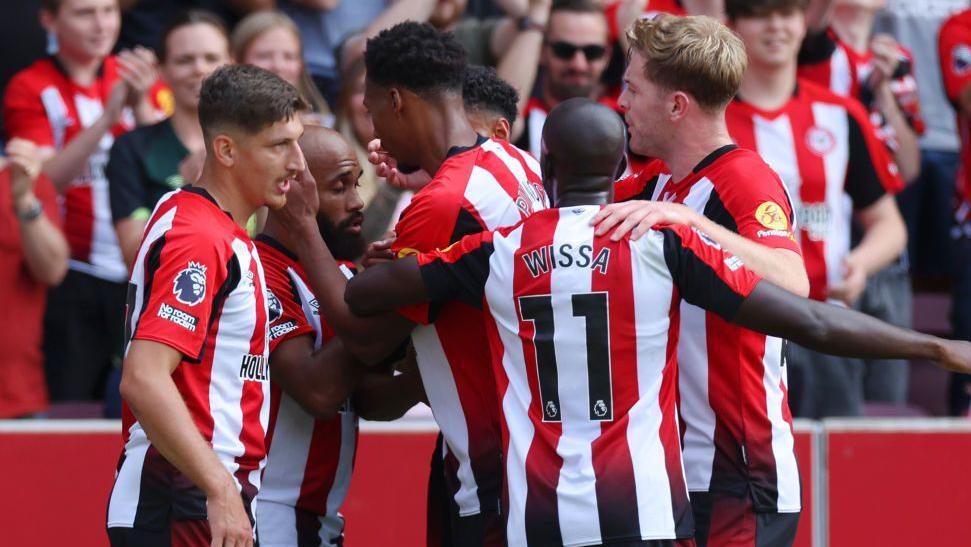 Brentford players celebrate a goal