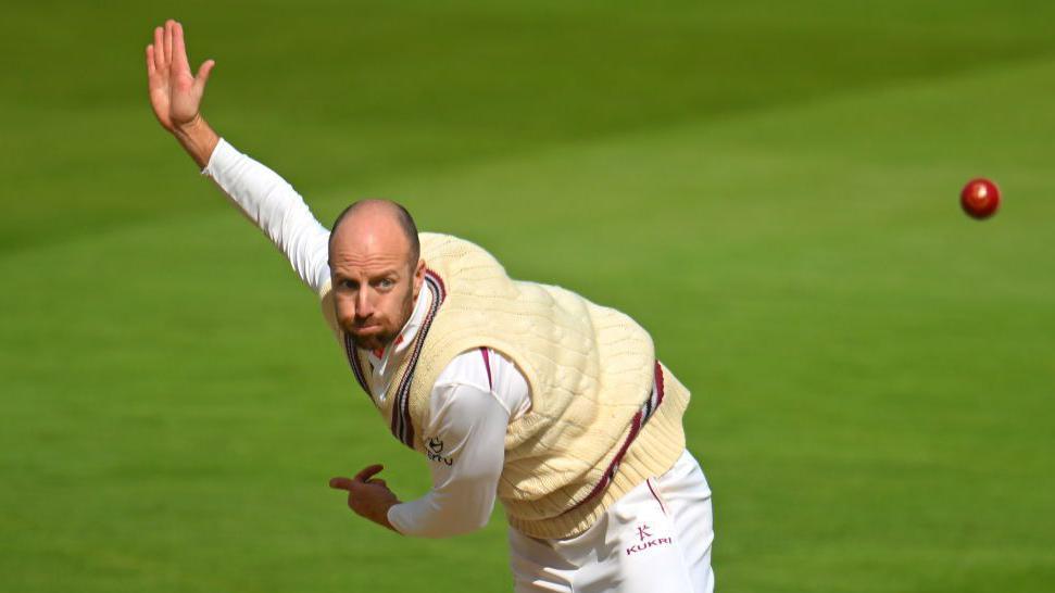 Jack Leach bowling for Somerset.