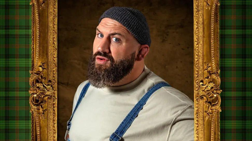 A close up image of a portrait of Joe Marler wearing a wooly hat and braces