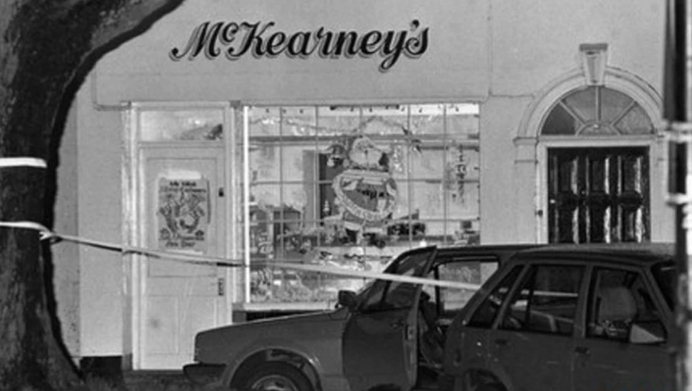 A black and white image of the exterior of the McKearney's butcher shop 