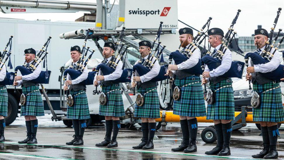Bagpipers at Glasgow Airport