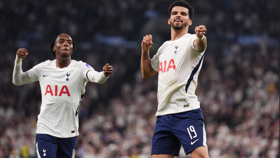 Tottenham's Dominic Solanke (right) celebrates scoring their side's second goal of the game during the Carabao Cup second round match against Charlton