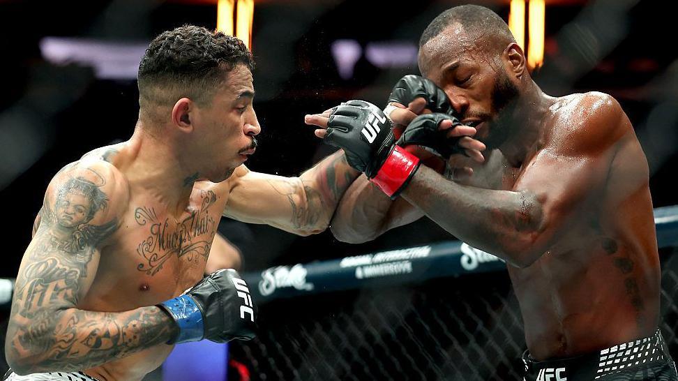 Carlos Prates punches Leon Edwards