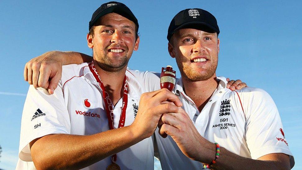 Steve Harmison, left, and Andrew Flintoff hold the Ashes urn