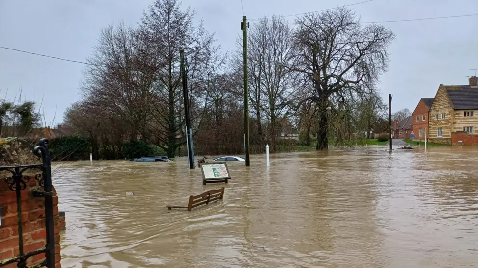 Cars submerged in flood waters in Bottesford, Leicestershire