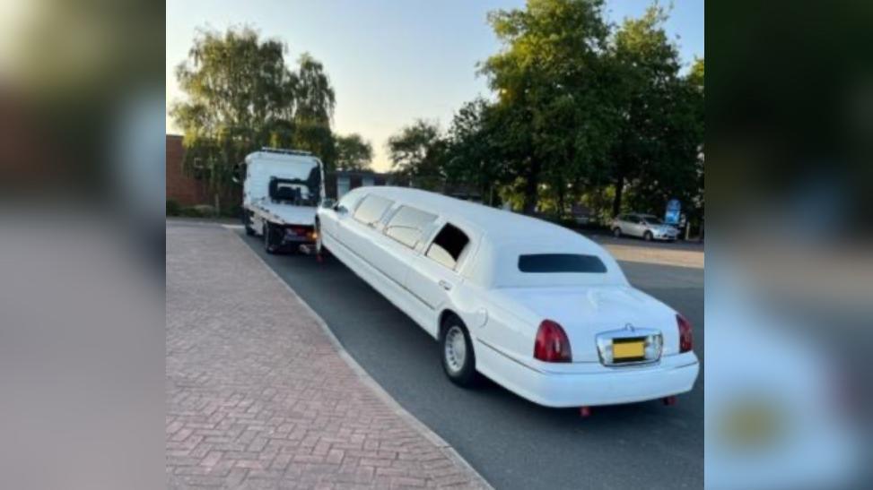 Limousine being towed away 