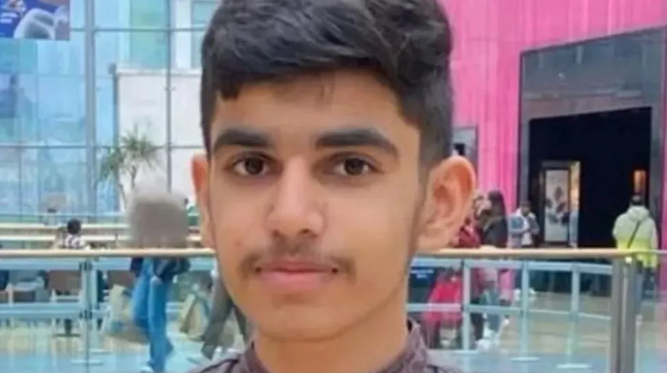 Muhammad Hassam Ali standing in the Birmingham Bullring shopping centre, cropped to just show his face and neck